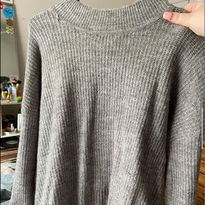 A grey sweater